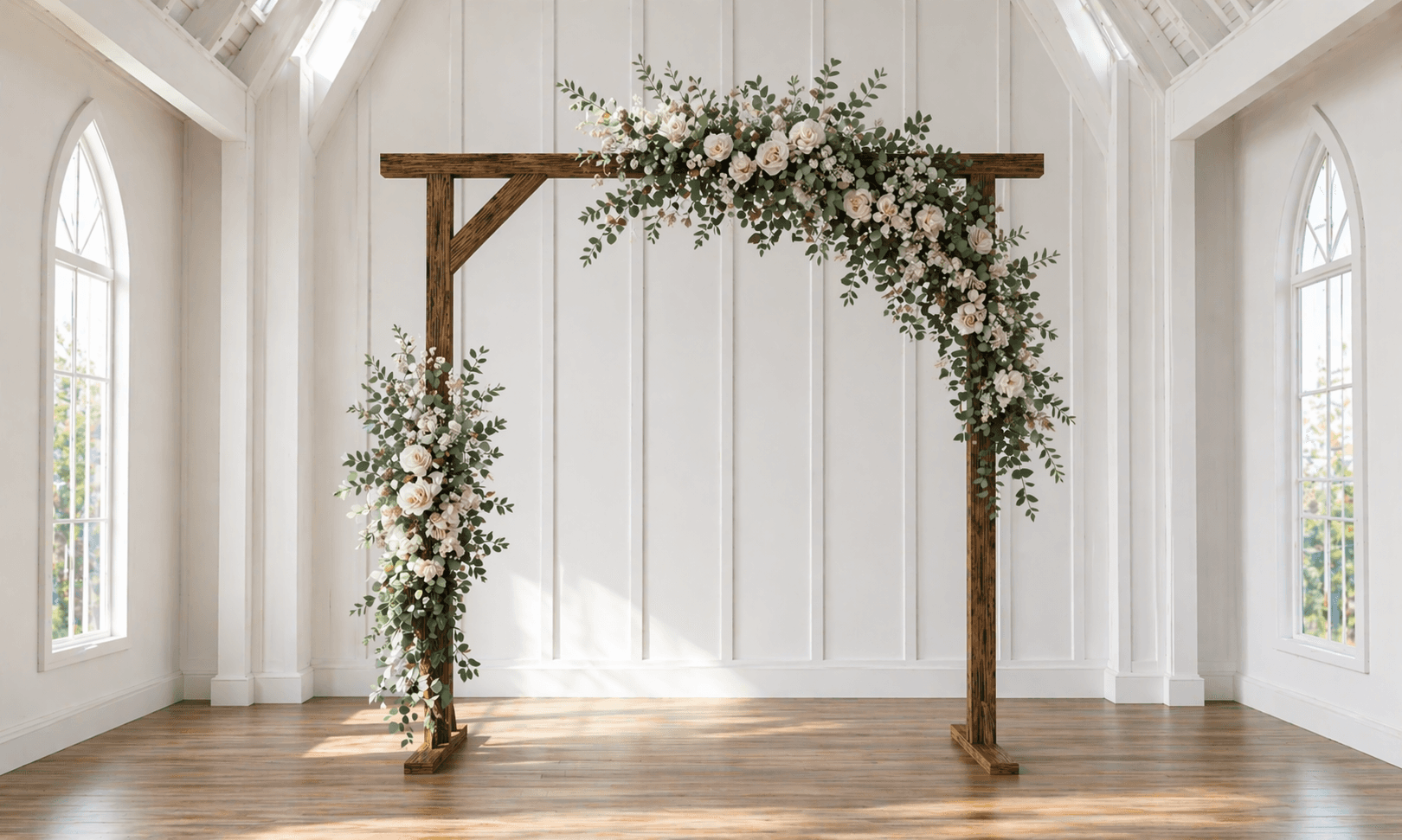 Simple freestanding wooden wedding ceremony arch with cross-braced feet