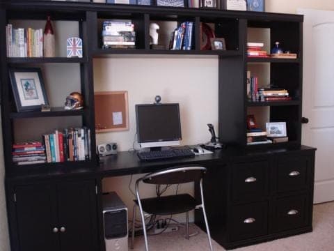Two-drawer file base cabinet with framed drawer faces