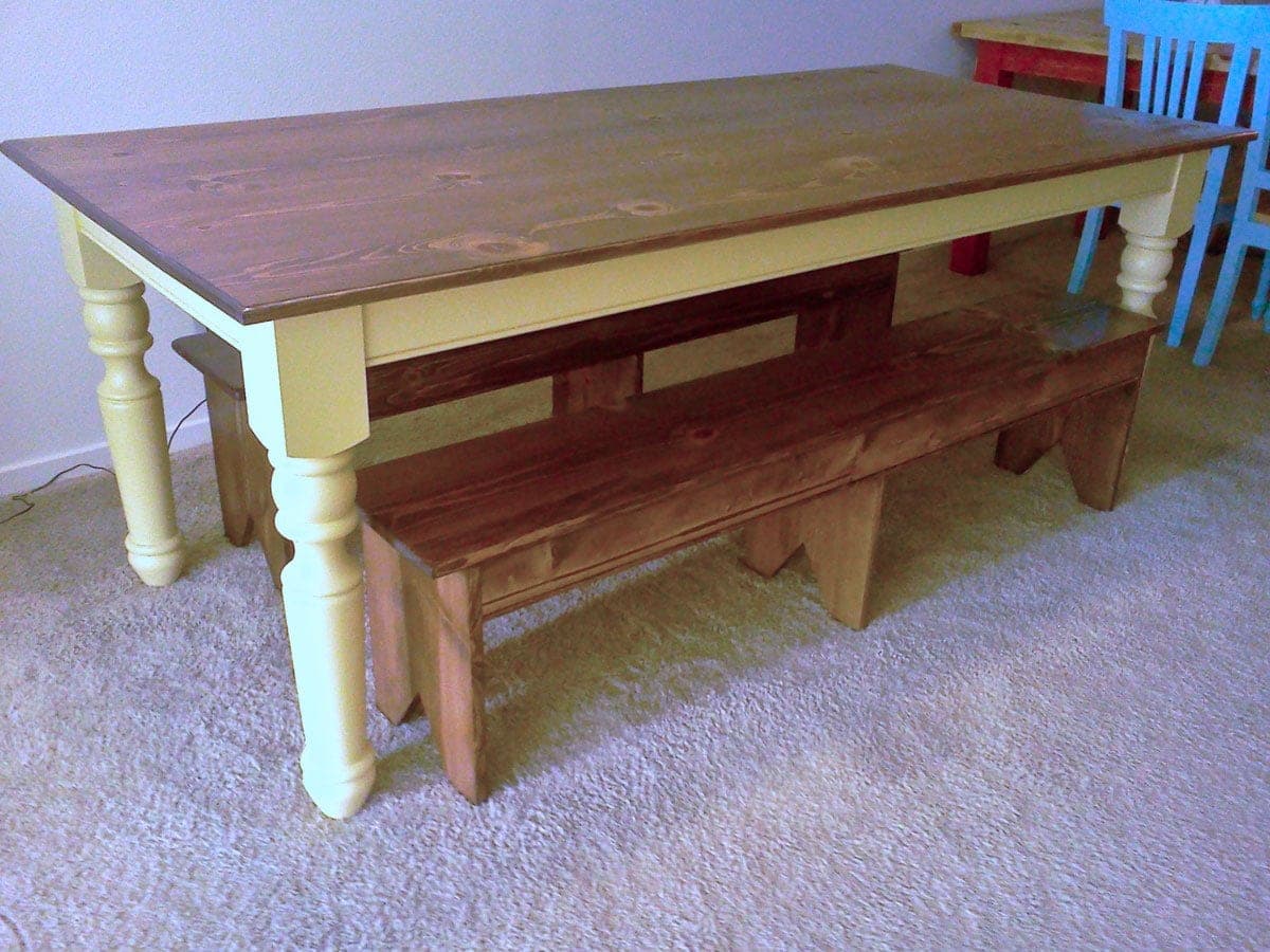 Farmhouse dining table with a solid pine slab top on purchased turned legs