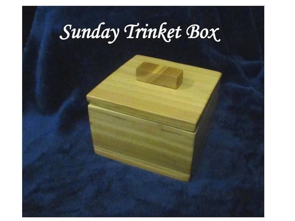 Small wooden trinket box with a floating inner lid