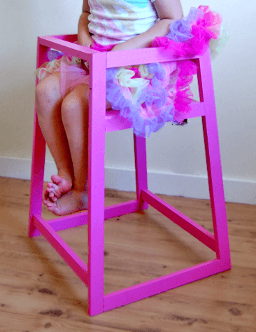 Wooden restaurant-style high chair with splayed legs