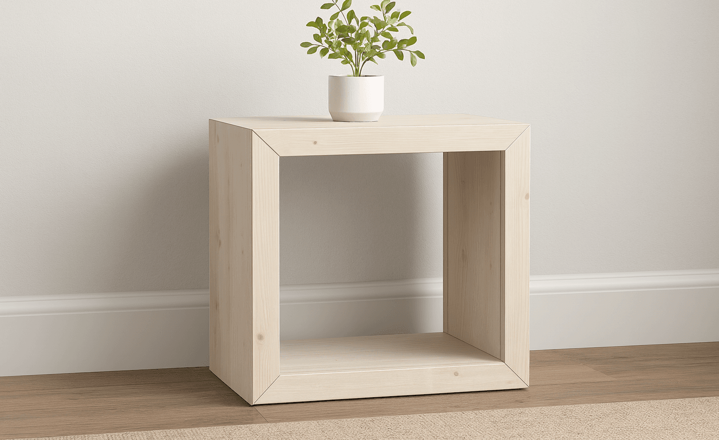 A small waterfall-mitered end table with a single open shelf
