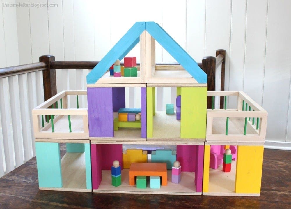 Modular stackable wooden dollhouse with interchangeable room, deck, and roof pieces