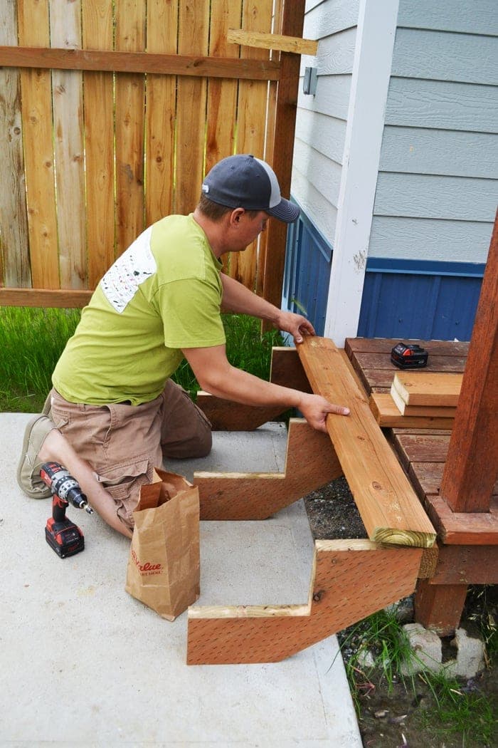 Notched-stringer wood deck stairs with open treads