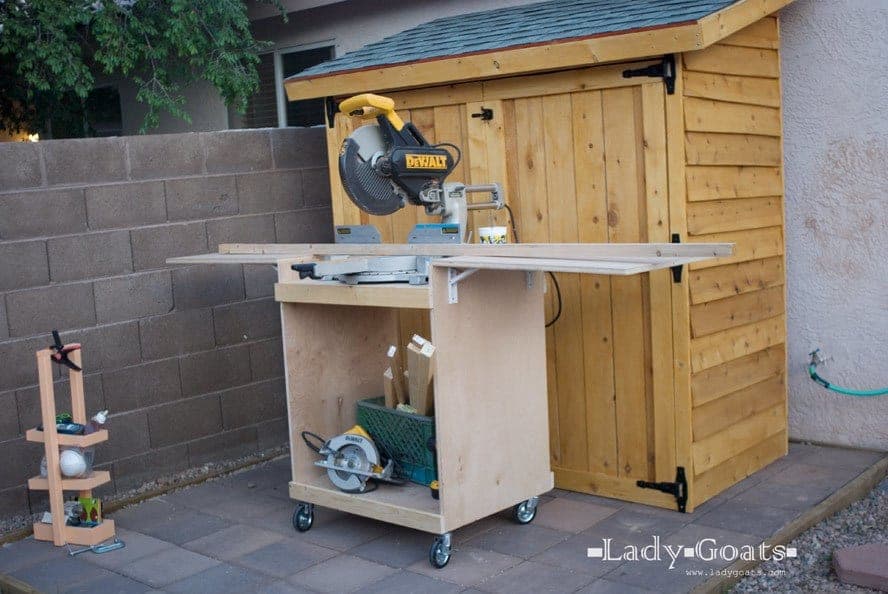 Rolling miter saw cart with fold-down support leaves