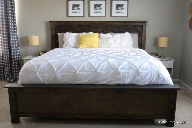 King bed with a wood shim textured headboard panel