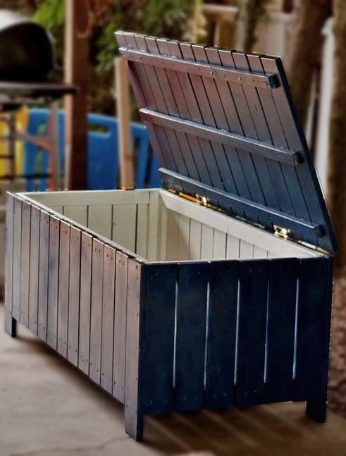 Outdoor storage bench with vertical-slat sides and a hinged lid