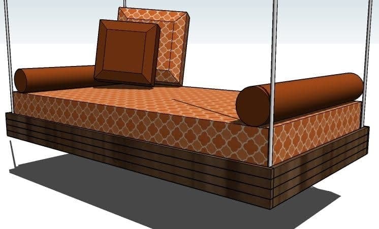 Hanging outdoor daybed suspended by chains from a porch ceiling