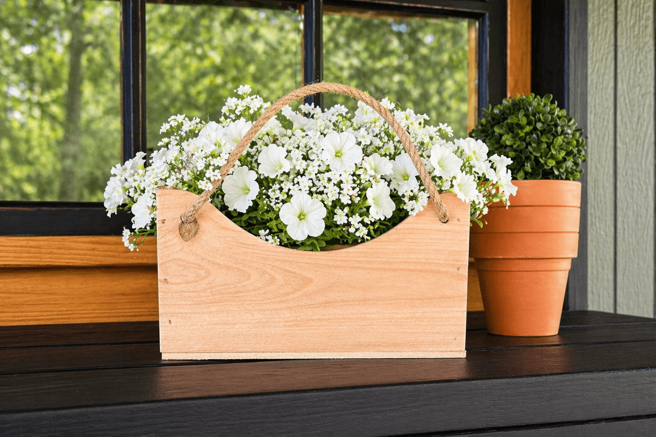 Small cedar gift tote with curved sides and a knotted rope handle