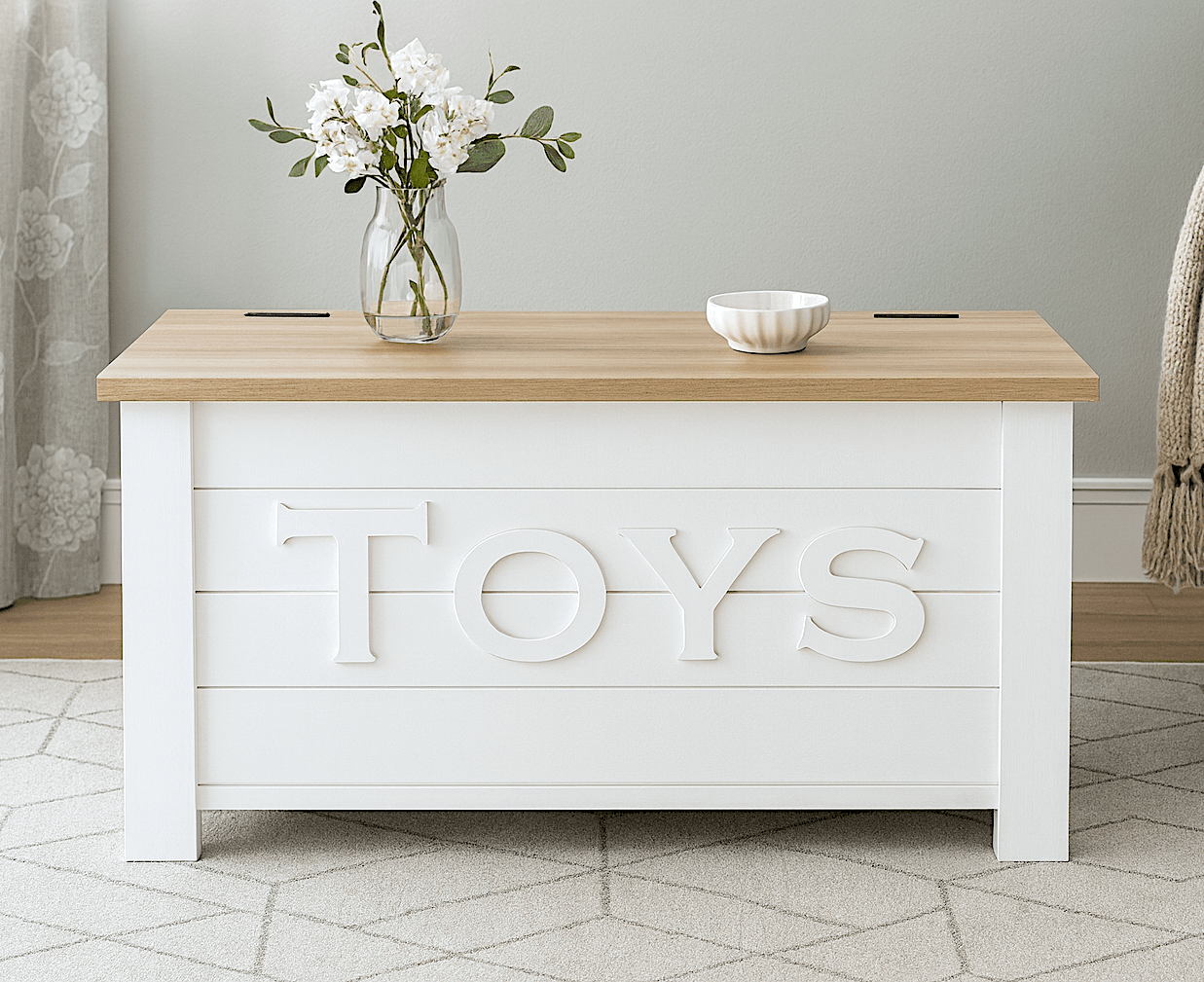 Planked farmhouse-style wooden toy box with hinged lid and corner legs