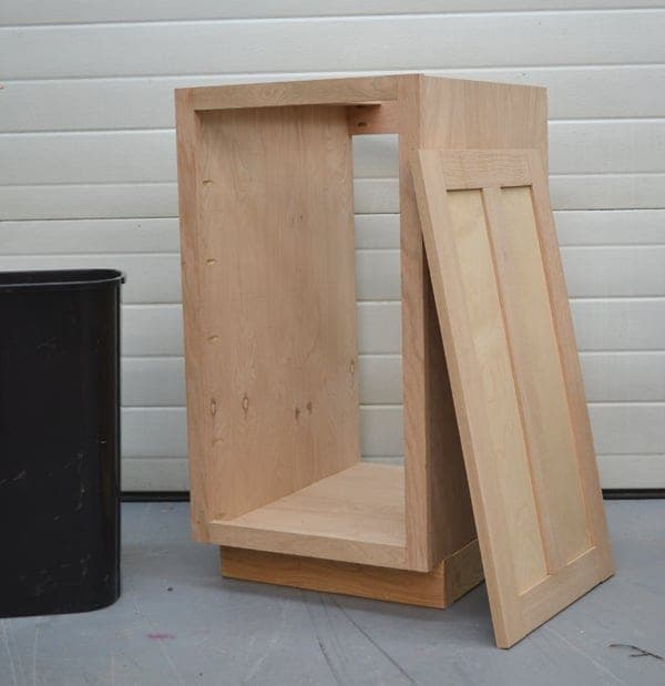 18-inch face-frame kitchen base cabinet with a trash pull-out
