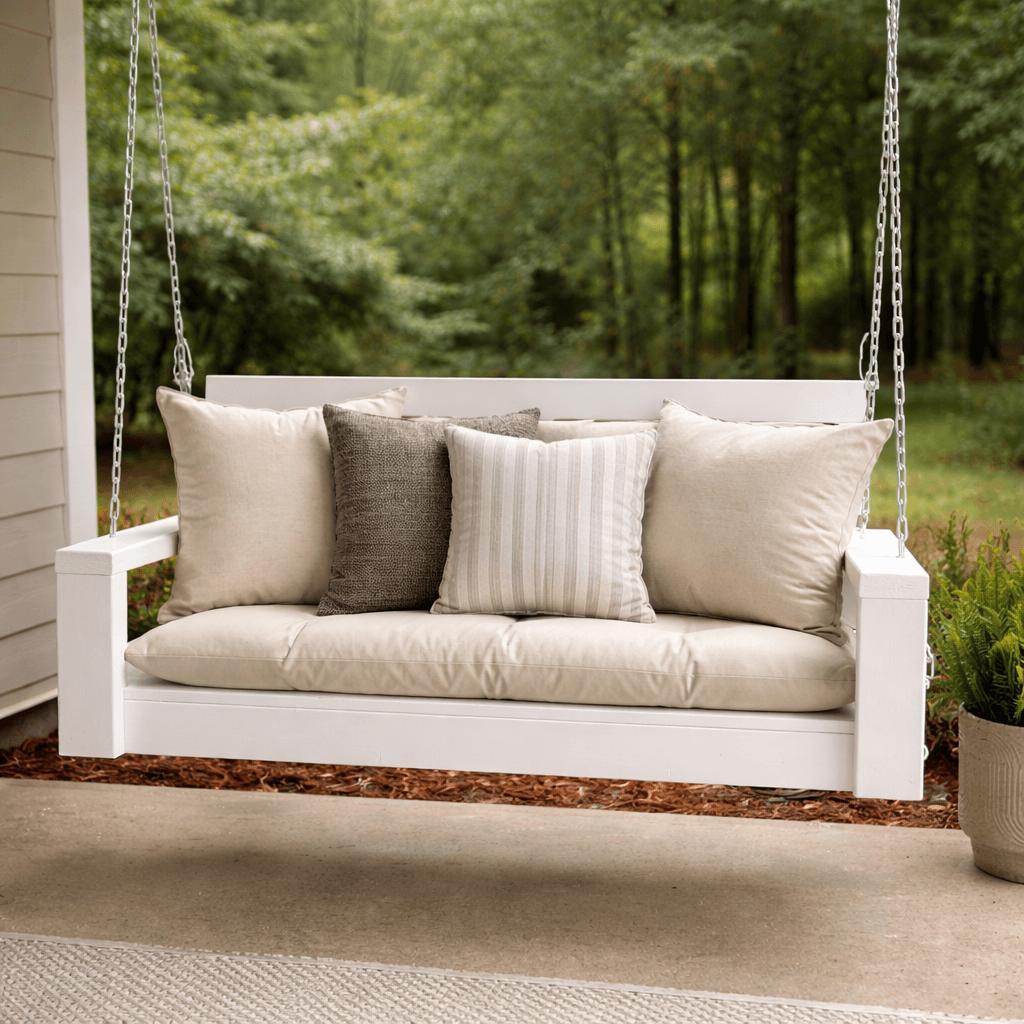 Wooden porch swing with slatted seat and back hanging from chains
