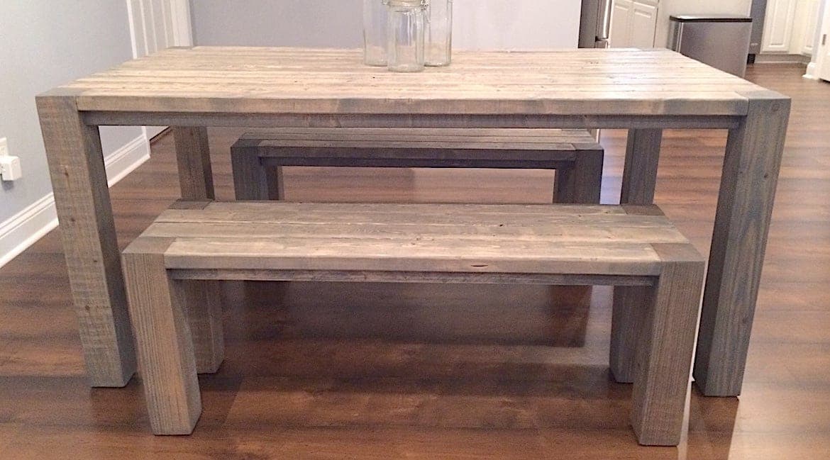 Rustic farmhouse dining table with 4x4 legs and a thick plank top