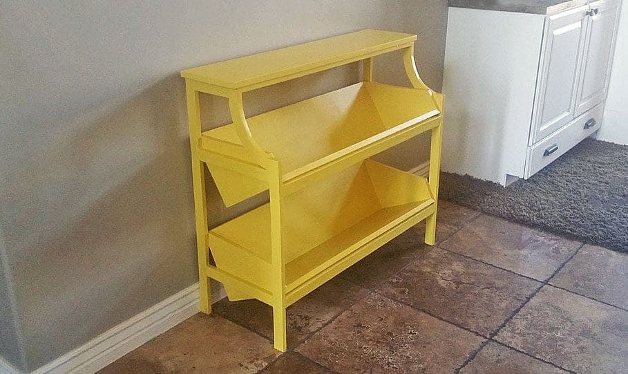 Console table with curved front panels and open shelving