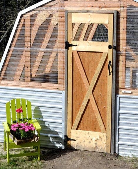 Z-braced sliding barn door with a plywood back panel