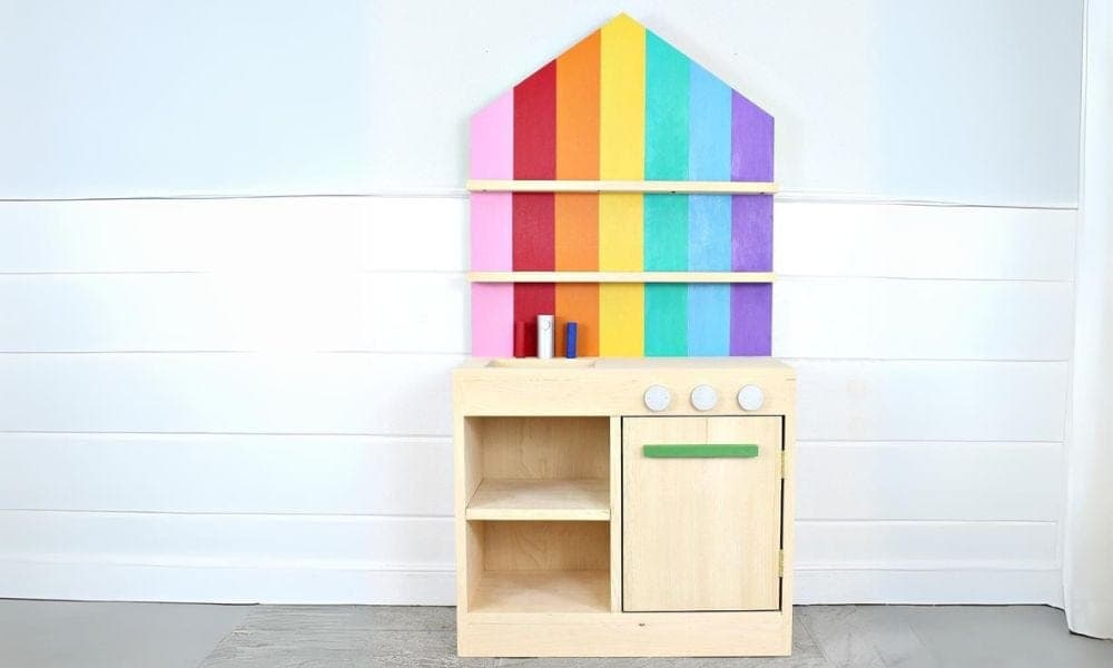 DIY toy play kitchen with an oven door and full back wall
