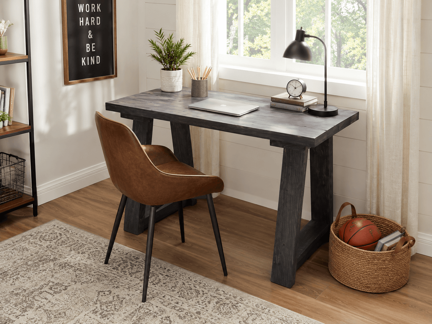 Small wooden trestle desk with splayed legs and plank top
