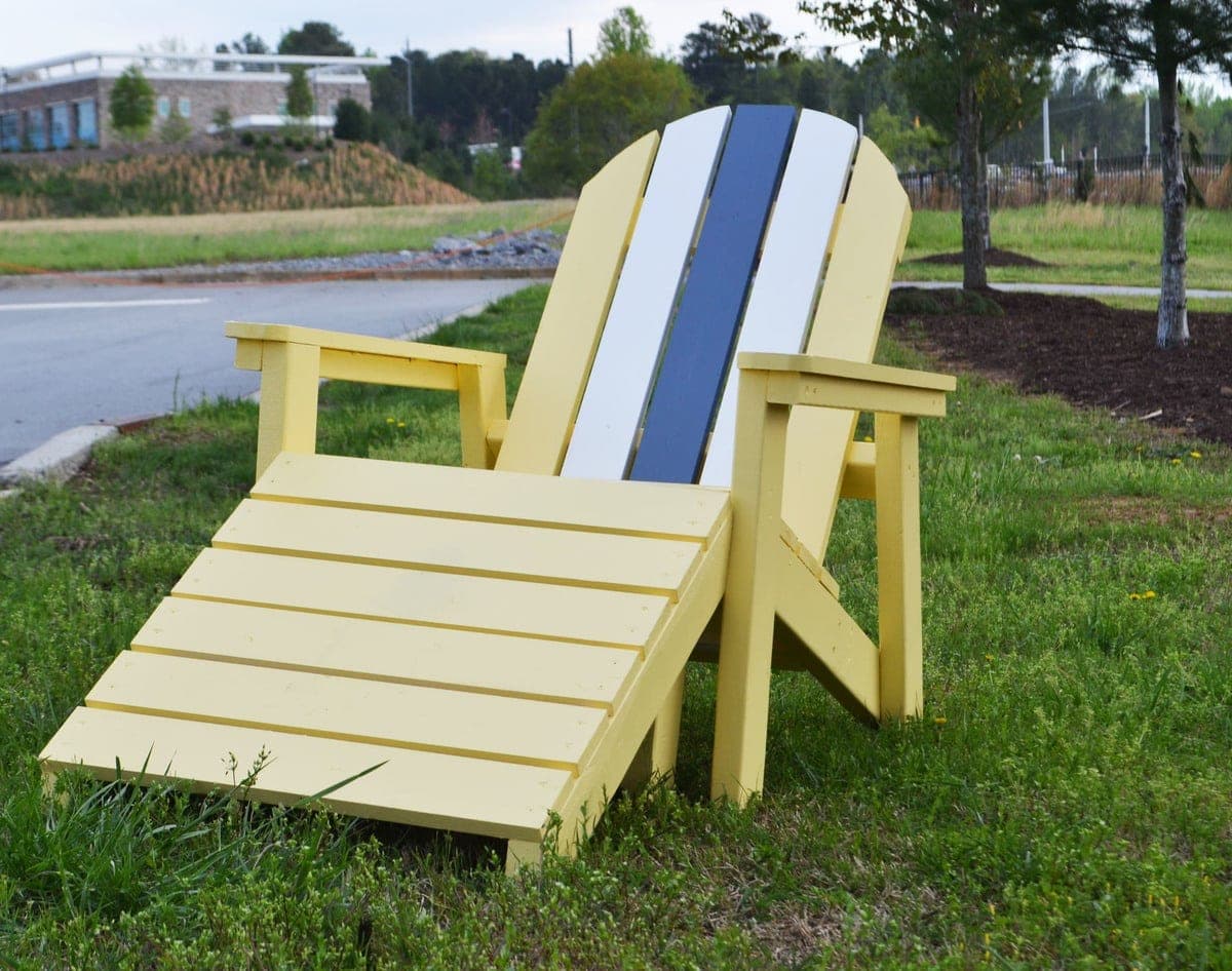 Angled footstool for an Adirondack chair