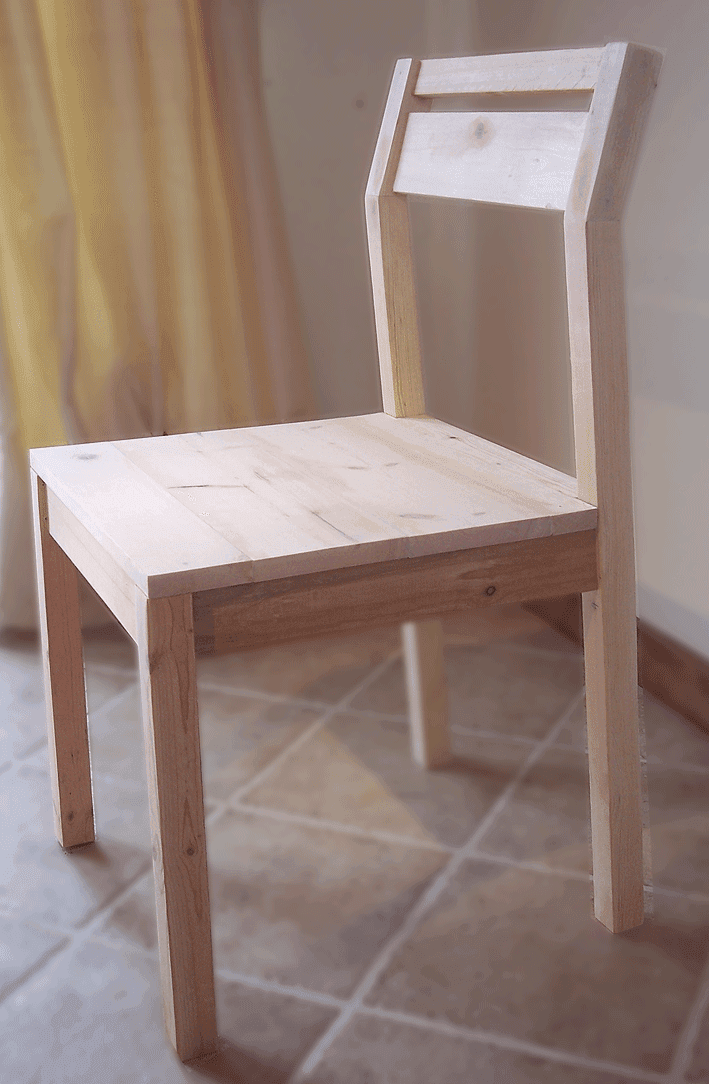 Modern wooden chair with raked back legs and a solid panel seat